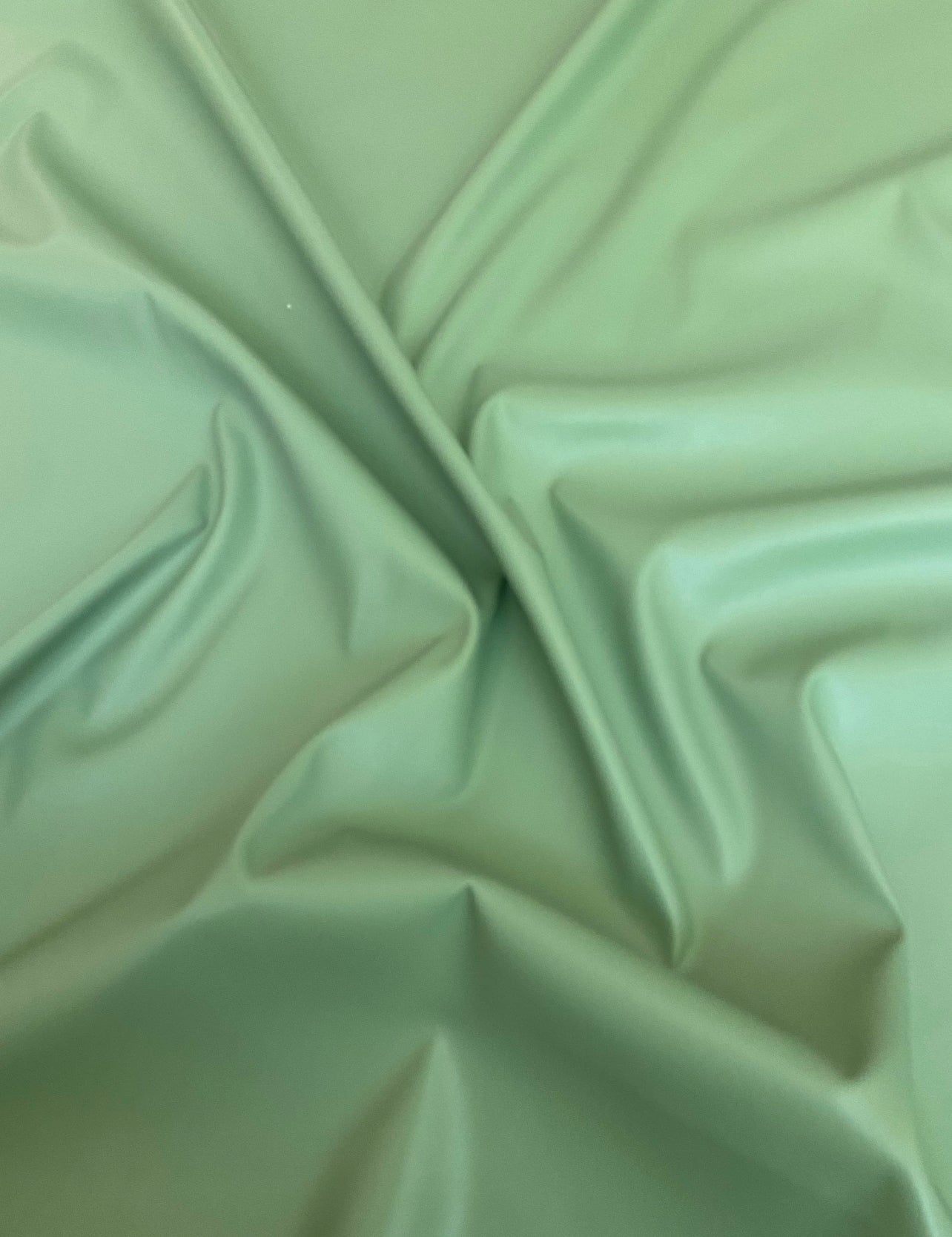 sage green stretch Faux Leather, light green Faux Leather, Faux Leather for jackets, Faux Leather for bags, Faux Leather on discount, Faux Leather on sale, premium Faux Leather, dark green Faux Leather, green Faux Leather, Faux Leather for tops, Faux Leather for leggings