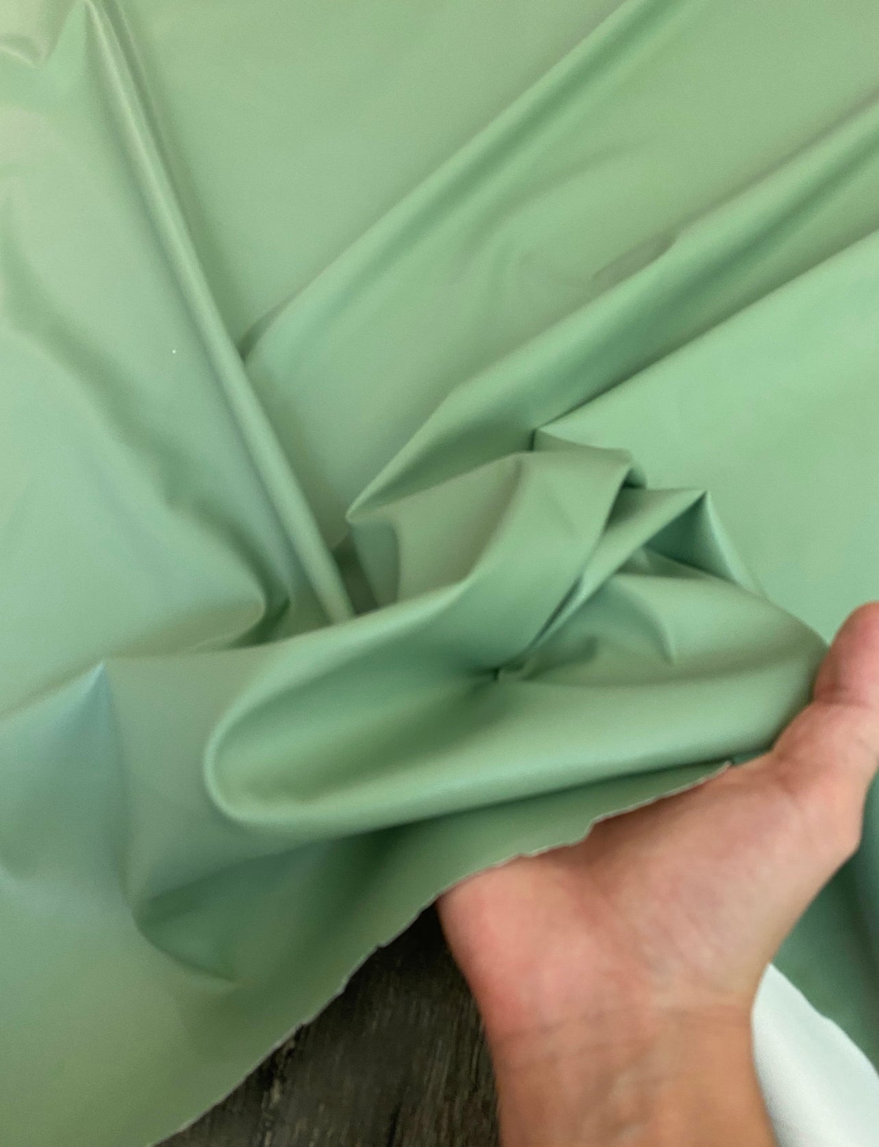 sage green stretch Faux Leather, light green Faux Leather, Faux Leather for jackets, Faux Leather for bags, Faux Leather on discount, Faux Leather on sale, premium Faux Leather, dark green Faux Leather, green Faux Leather, Faux Leather for tops, Faux Leather for leggings
