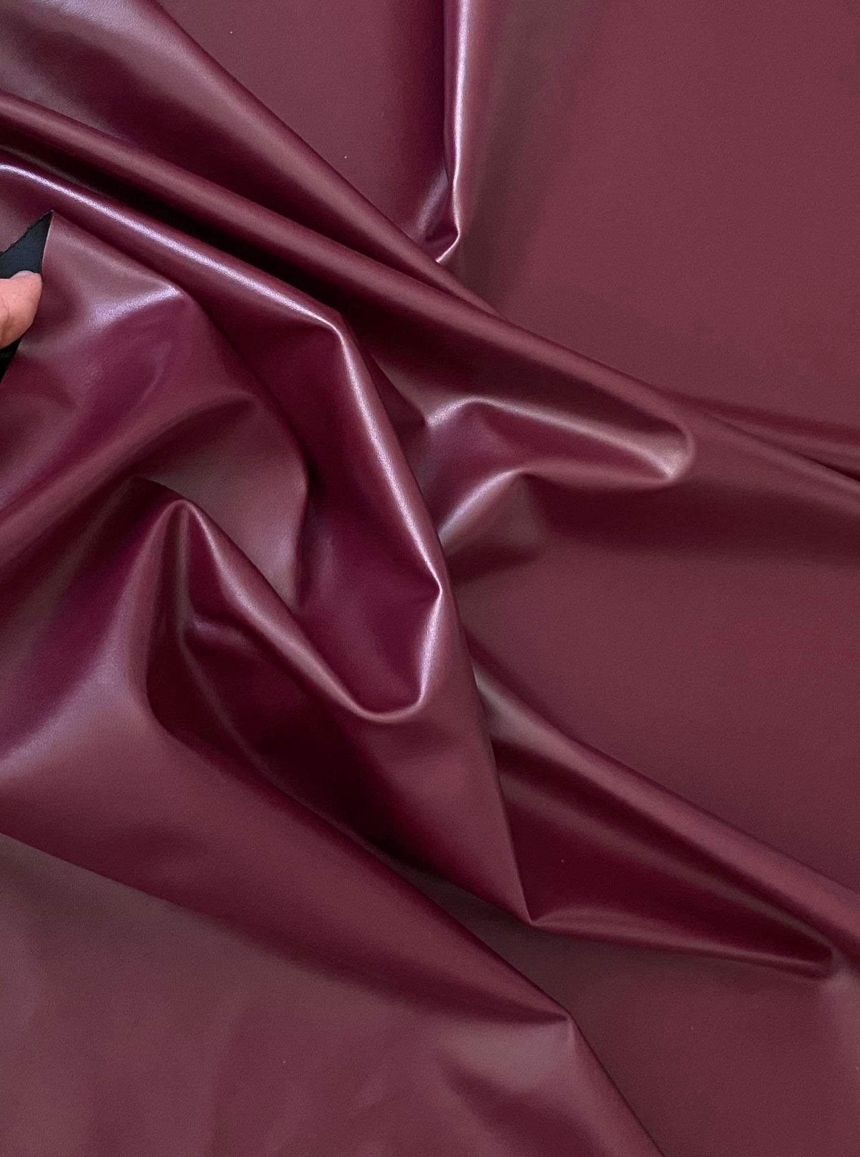 burgundy stretch faux leather, burgundy stretch pleather, burgundy stretch soft vinyl, burgundy stretch vinyl, faux leather stretch for clothing, Faux Leather for jackets, Faux Leather for bags, Faux Leather on discount, Faux Leather on sale, premium Faux Leather, burgundy Faux Leather, maroon Faux Leather, Faux Leather for tops, Faux Leather for leggings