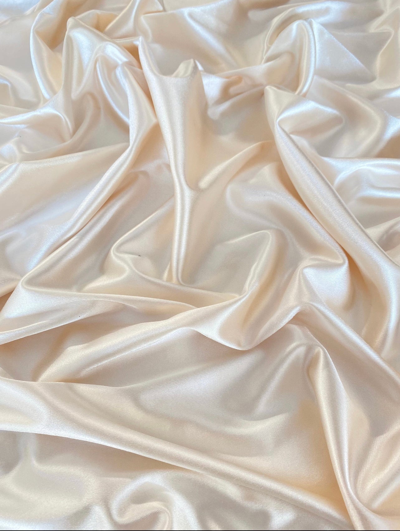 ivory shiny nylon spandex, ivory stretch nylon spandex, ivory shiny nylon spandex for woman, ivory shiny nylon spandex for bride, spandex for swim wear, premium spandex, spandex on sale, low price spandex, buy spandex online, cheap spandex