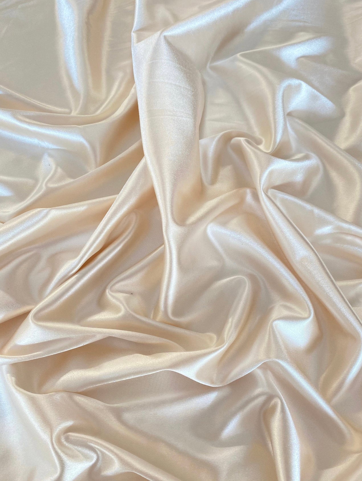 ivory shiny nylon spandex, ivory stretch nylon spandex, ivory shiny nylon spandex for woman, ivory shiny nylon spandex for bride, spandex for swim wear, premium spandex, spandex on sale, low price spandex, buy spandex online, cheap spandex