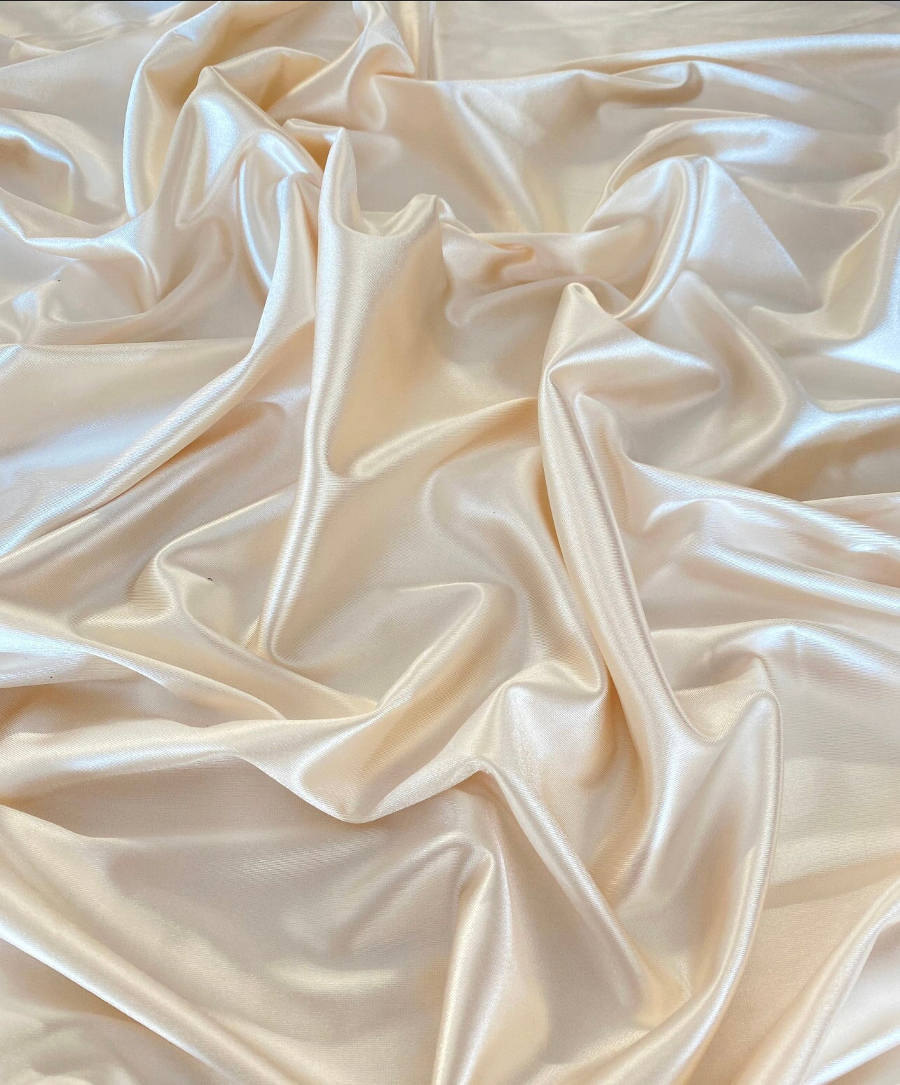 ivory shiny nylon spandex, ivory stretch nylon spandex, ivory shiny nylon spandex for woman, ivory shiny nylon spandex for bride, spandex for swim wear, premium spandex, spandex on sale, low price spandex, buy spandex online, cheap spandex