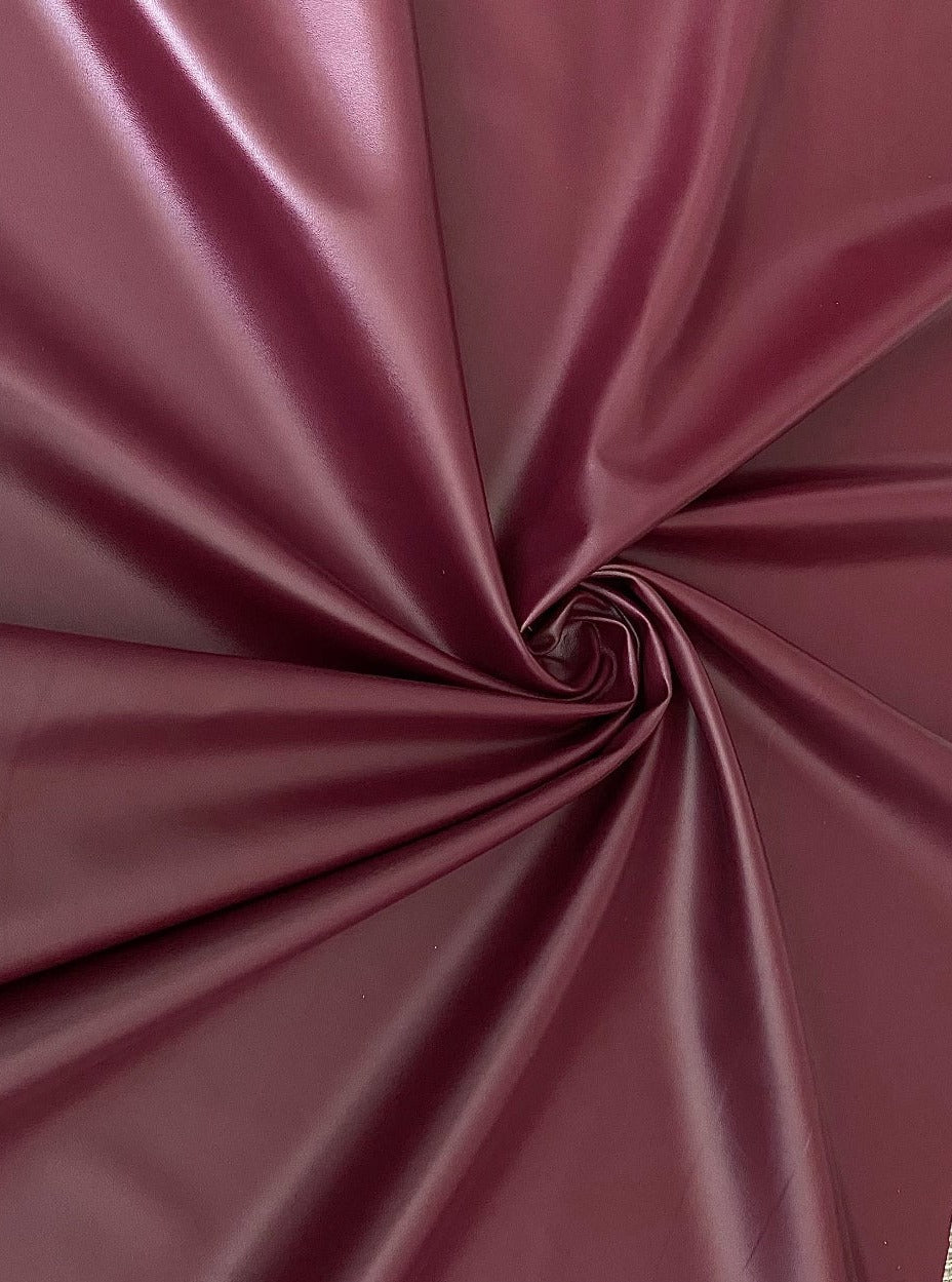 burgundy stretch faux leather, burgundy stretch pleather, burgundy stretch soft vinyl, burgundy stretch vinyl, faux leather stretch for clothing, Faux Leather for jackets, Faux Leather for bags, Faux Leather on discount, Faux Leather on sale, premium Faux Leather, burgundy Faux Leather, maroon Faux Leather, Faux Leather for tops, Faux Leather for leggings