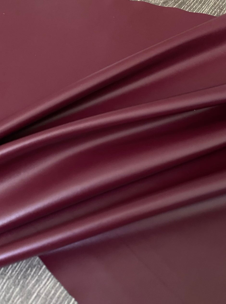 burgundy stretch faux leather, burgundy stretch pleather, burgundy stretch soft vinyl, burgundy stretch vinyl, faux leather stretch for clothing, Faux Leather for jackets, Faux Leather for bags, Faux Leather on discount, Faux Leather on sale, premium Faux Leather, burgundy Faux Leather, maroon Faux Leather, Faux Leather for tops, Faux Leather for leggings