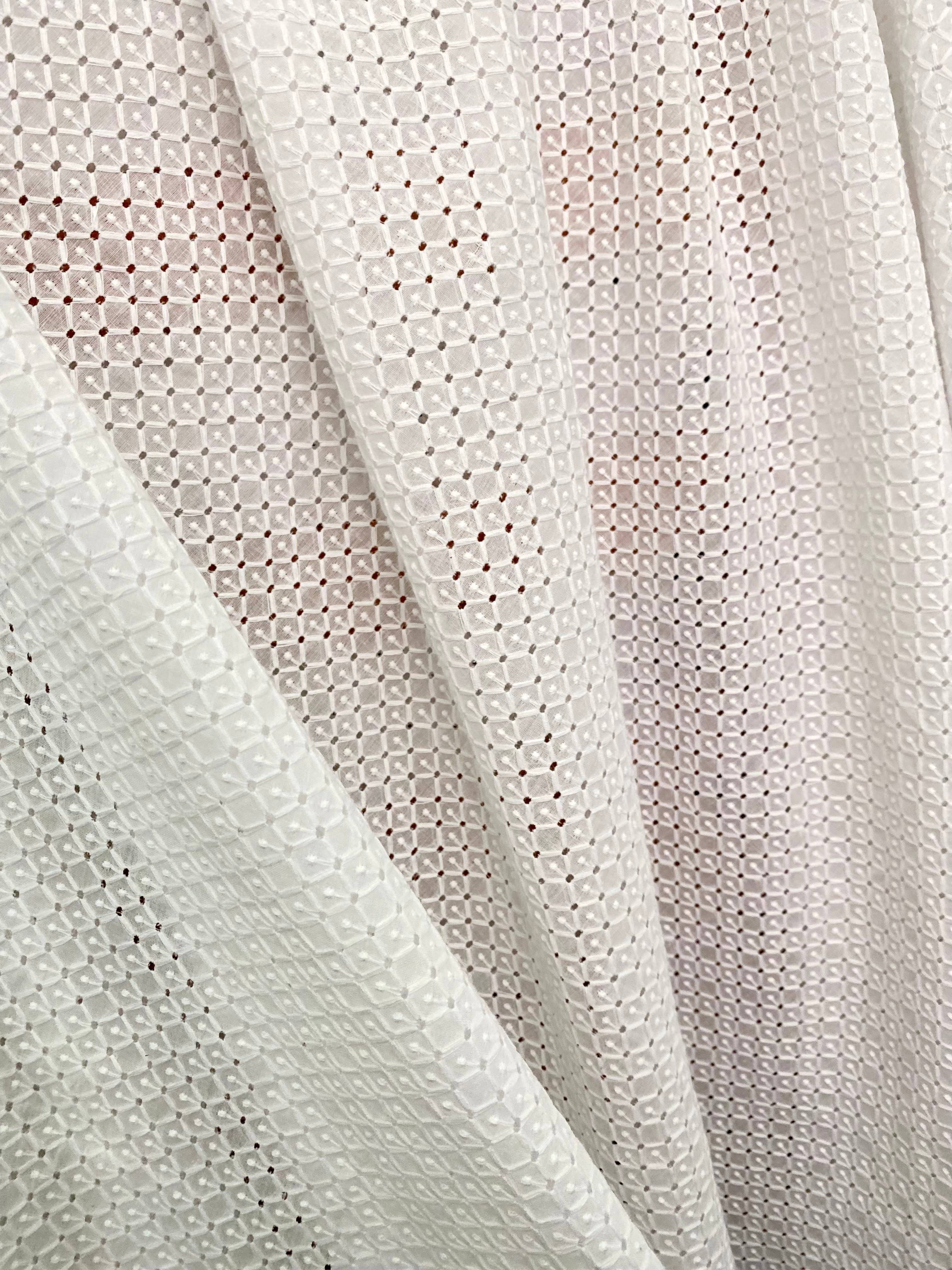 White geometric Cotton Eyelet, cotton eyelets for woman, off white cotton eyelets, milky white cotton eyelets, cotton eyelet in low price, premium cotton eyelets, kiki textile cotton eyelets
