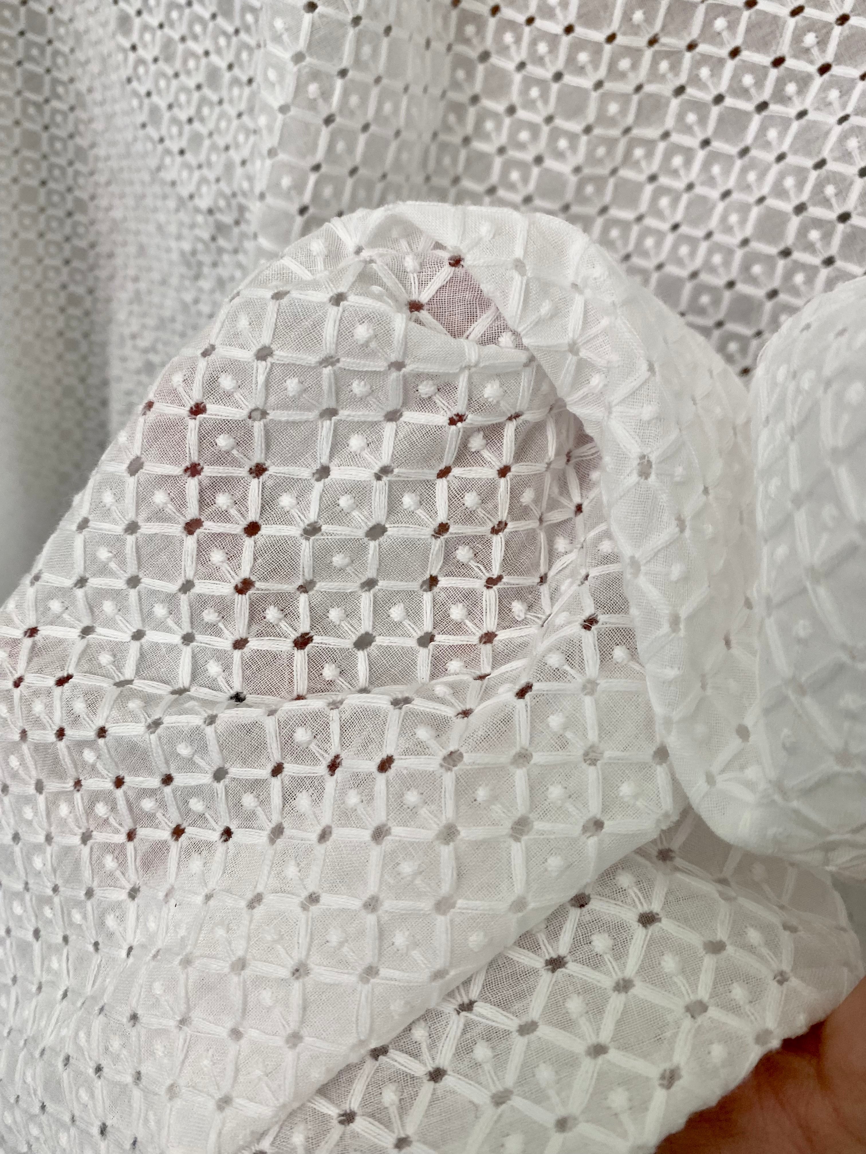 White geometric Cotton Eyelet, cotton eyelets for woman, off white cotton eyelets, milky white cotton eyelets, cotton eyelet in low price, premium cotton eyelets, kiki textile cotton eyelets