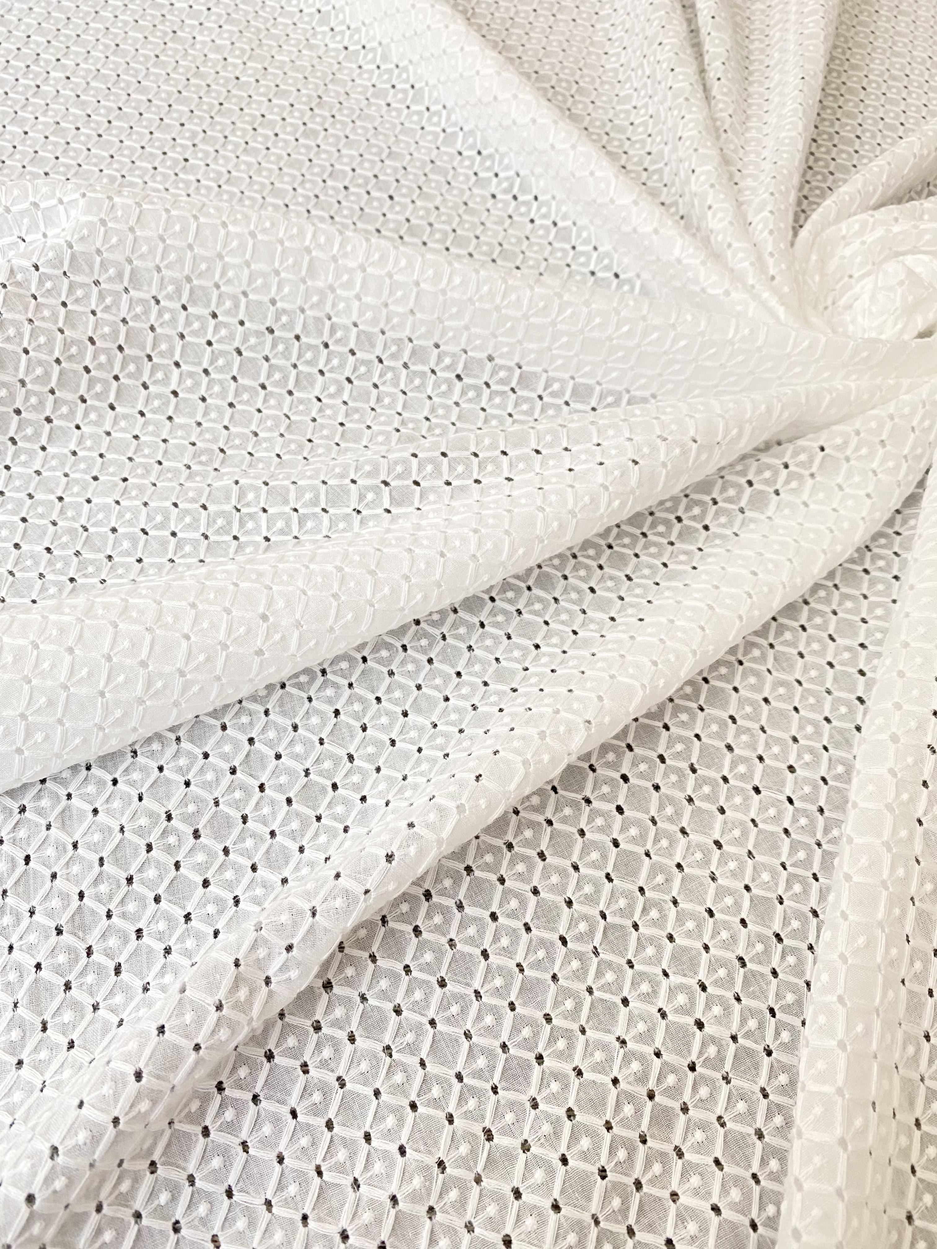 White geometric Cotton Eyelet, cotton eyelets for woman, off white cotton eyelets, milky white cotton eyelets, cotton eyelet in low price, premium cotton eyelets, kiki textile cotton eyelets