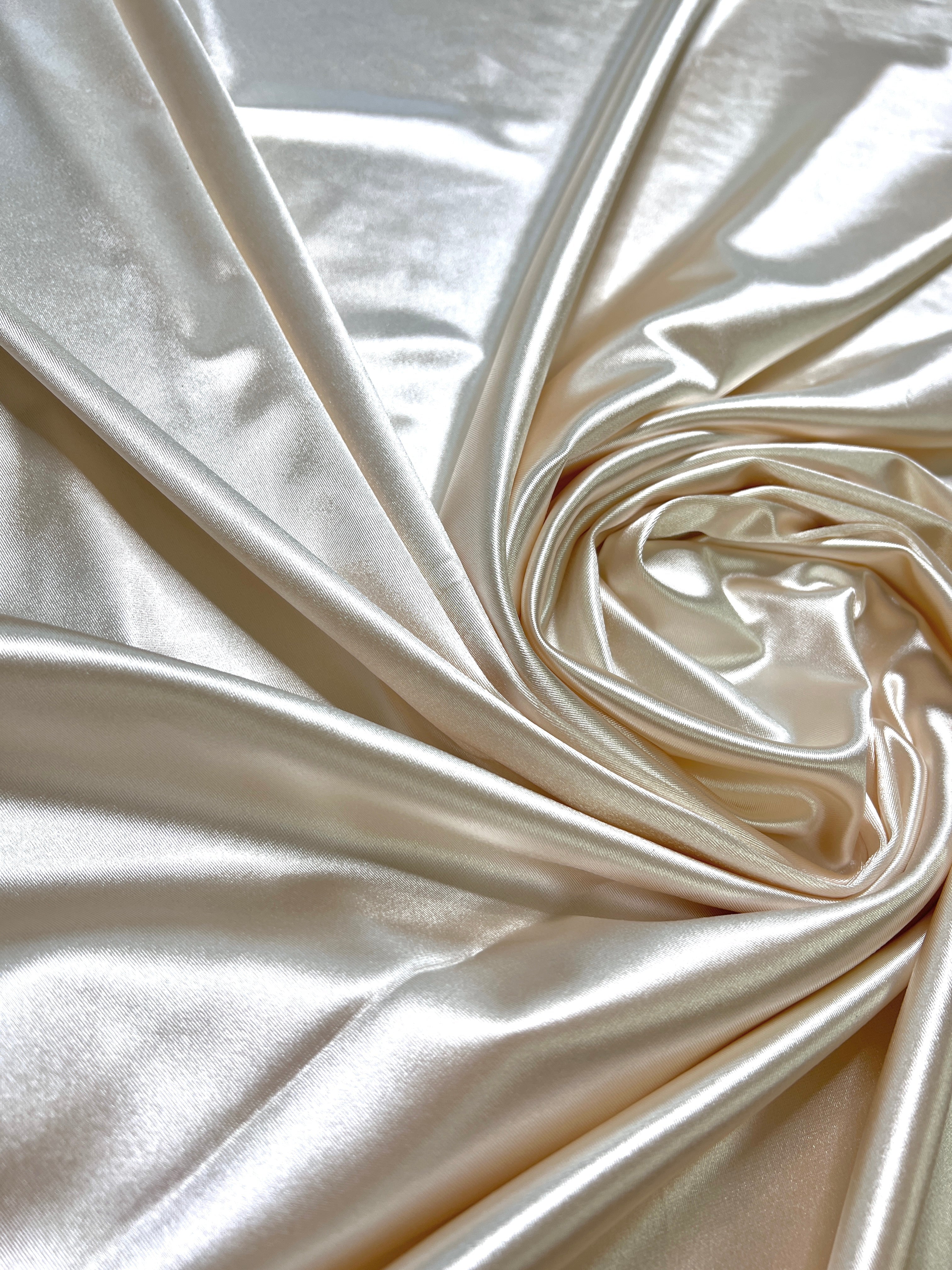 ivory shiny spandex, ivory stretch spandex, ivory shiny spandex for woman, ivory shiny spandex for bride, spandex for swim wear, premium spandex, spandex on sale, low price spandex, buy spandex online, cheap spandex