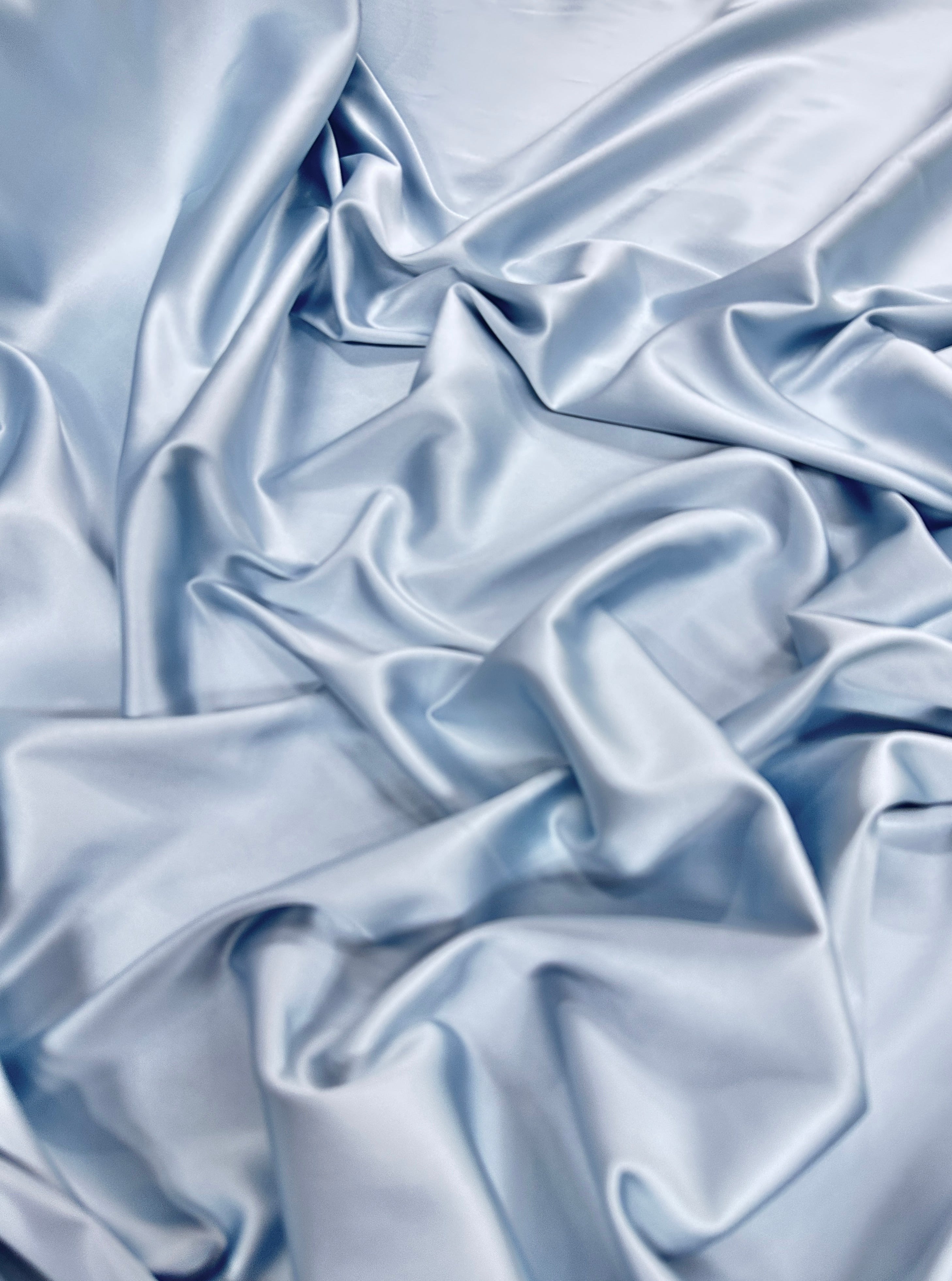 Natural silk, pure silk, 100% pure silk, dusty blue silk, dusty blue natural silk, dusty blue silk satin, dusty blue silk online, light blue silk, baby blue silk, blue silk, natural fabric, kiki textiles, online fabric store usa, luxurious fabric, silk satin online, fancy silk, soft silk, smooth silk, 100% natural silk, charmeuse satin