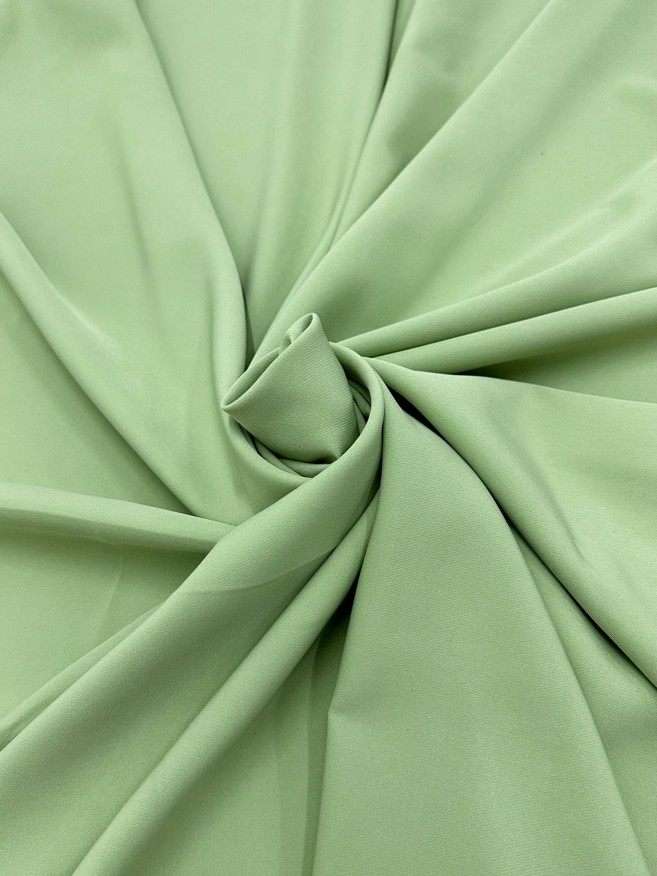 pistachio stretch crepe, pistachio color fabric, green fabric, green dress for woman, pistachio bridal dress, bridal luxury dress, fabric for woman, 4 way stretch, buy fabric online, discounted fabric, fabric on sale, crepe fabric, bridal crepe, crepe for dress, wedding crepe, chiffon crepe, crepe clothing material
