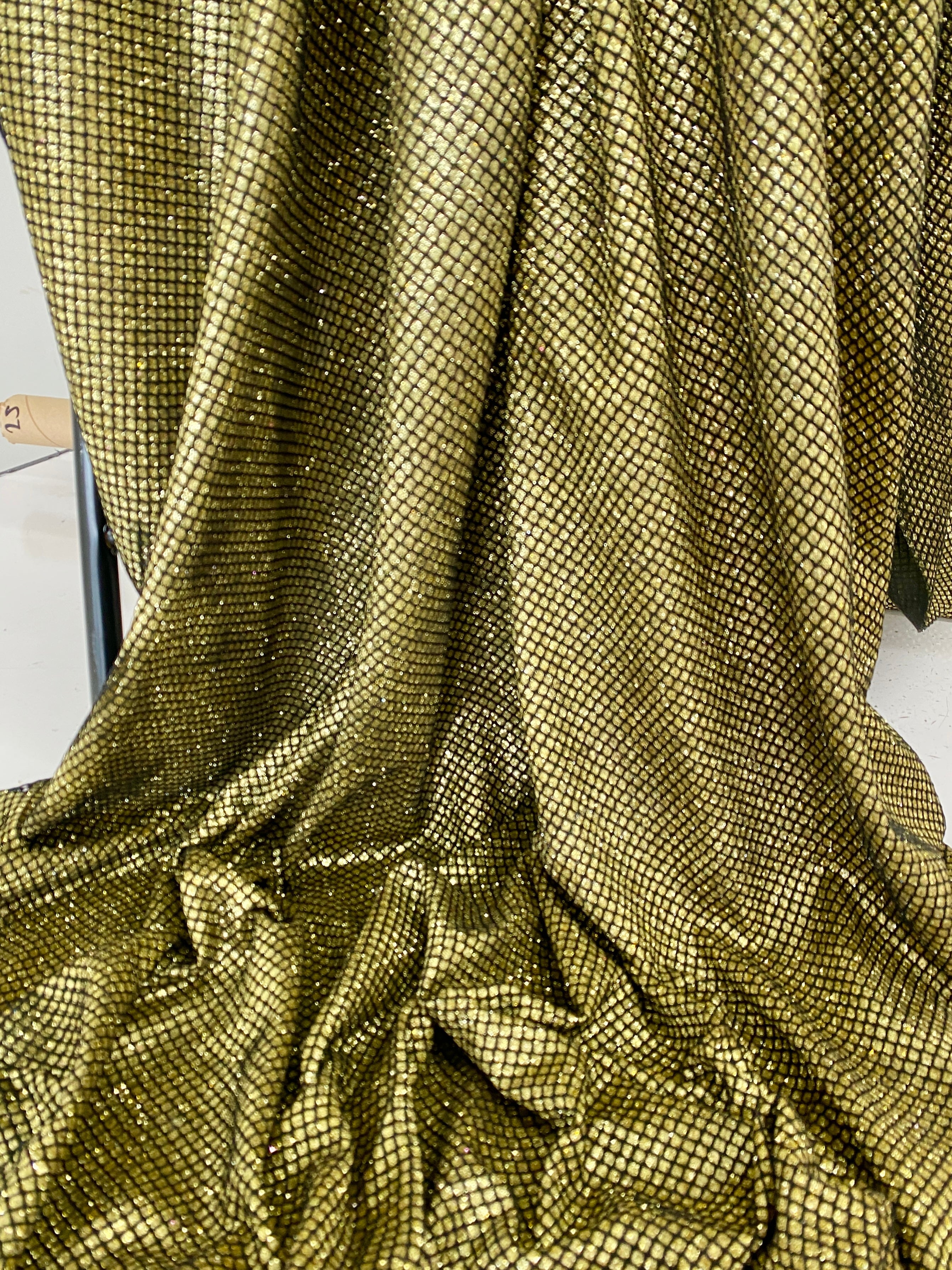 gold metallic lurex, gold sparkly fabric, gold metallic fabric, gold glitter fabric, gold glitter lurex, gold shimmer fabric, gold shiny fabric, lurex for woman, party wear lurex, shiny lurex, lurex for bride, lurex on discount, lurex on sale, buy lurex online