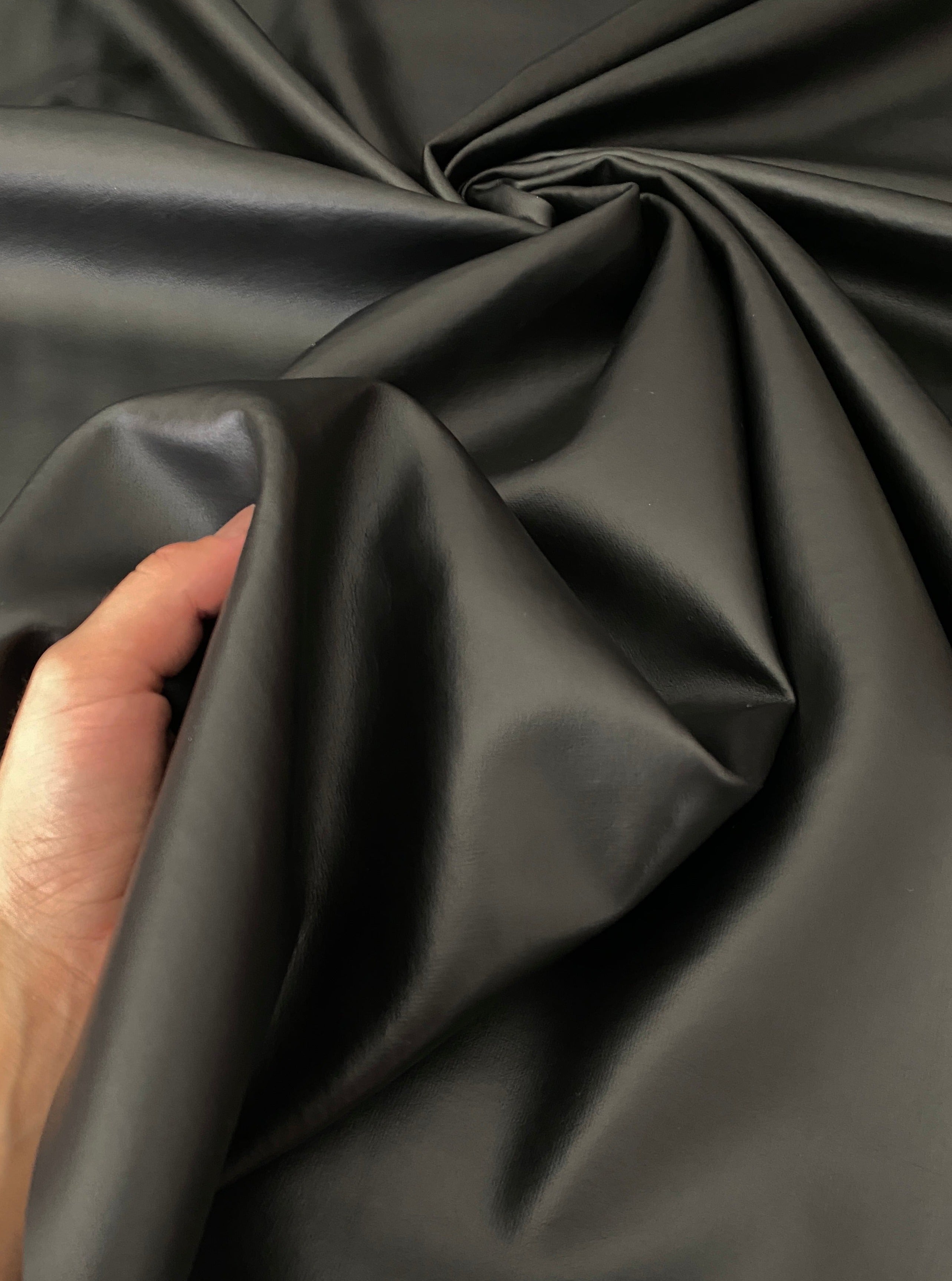 black upholstery vinyl, black vinyl, black faux leather, black leather, charcoal color, vinyl store usa, kiki textiles, leather on discount, vinyl fabric for pants, Black Matte Smooth Vinyl,  vinyl for Furniture,  vinyl for Jacket, Faux Leather by the yard, vinyl on discount, vinyl on sale