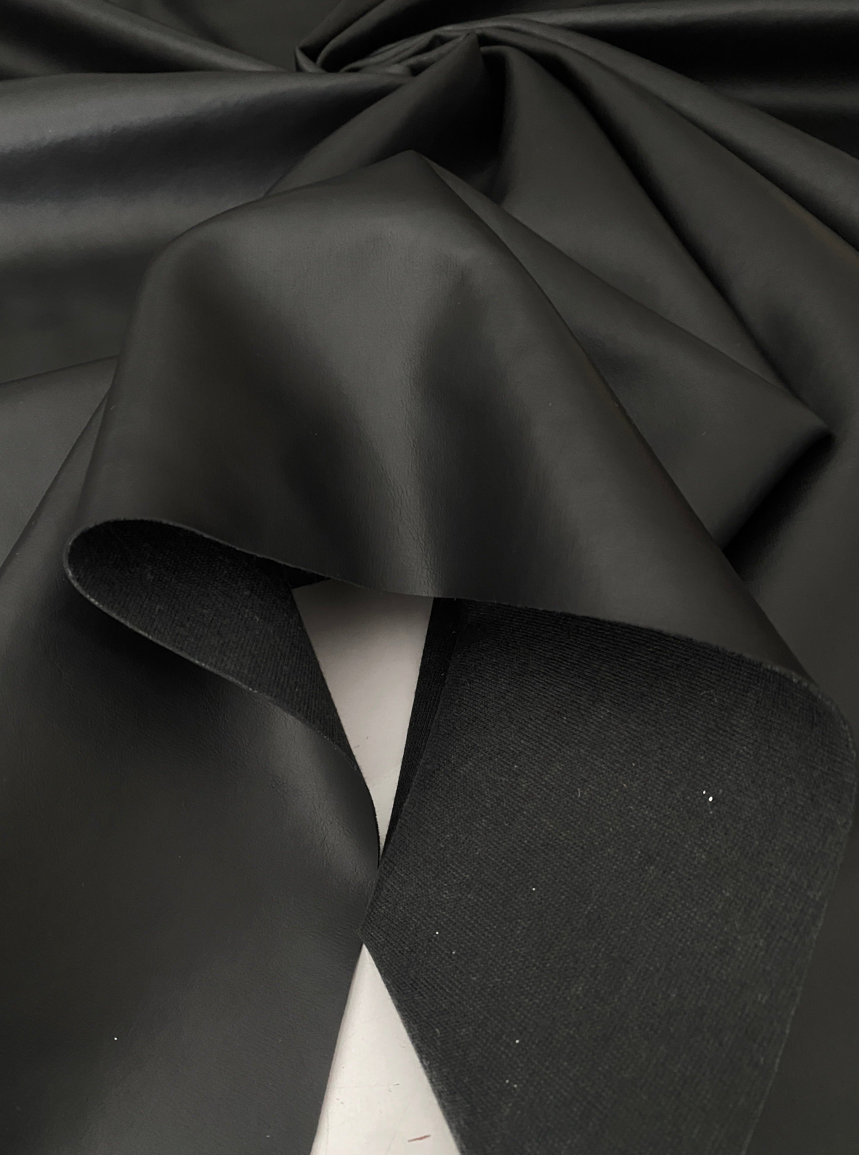 black upholstery vinyl, black vinyl, black faux leather, black leather, charcoal color, vinyl store usa, kiki textiles, leather on discount, vinyl fabric for pants, Black Matte Smooth Vinyl,  vinyl for Furniture,  vinyl for Jacket, Faux Leather by the yard, vinyl on discount, vinyl on sale