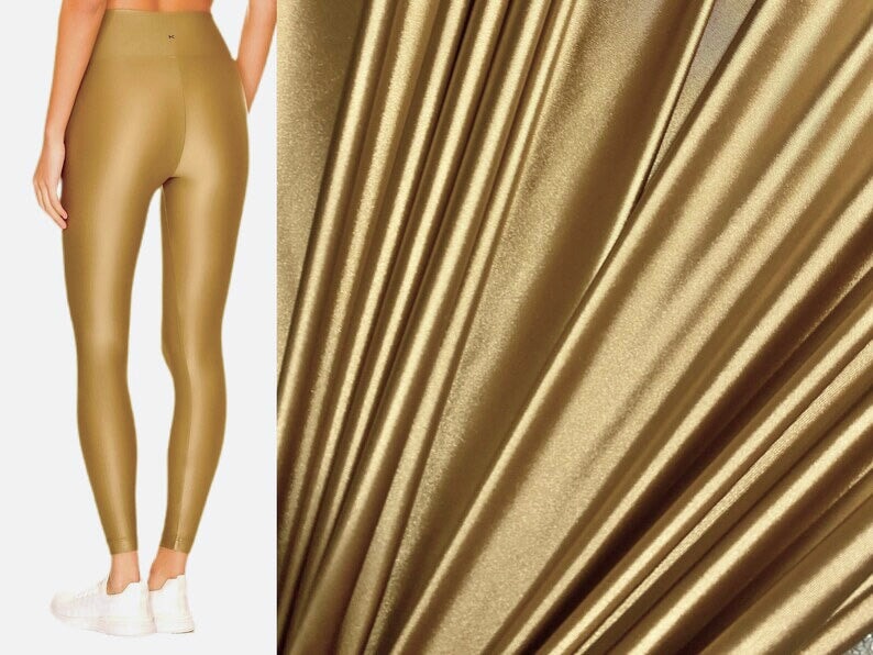 gold spandex, gold foiled spandex, gold milliskin spandex, gold nylon spandex fabric, gold swimwear fabric, gold spandex fabric for leggings, gold metallic spandex, gold spandex for woman, gold spandex for bride, gold spandex in low price, spandex on sale, discounted spandex, premium spandex, buy spandex online