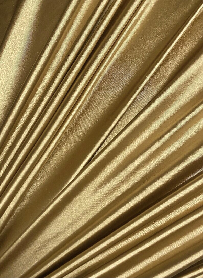 gold spandex, gold foiled spandex, gold milliskin spandex, gold nylon spandex fabric, gold swimwear fabric, gold spandex fabric for leggings, gold metallic spandex, gold spandex for woman, gold spandex for bride, gold spandex in low price, spandex on sale, discounted spandex, premium spandex, buy spandex online