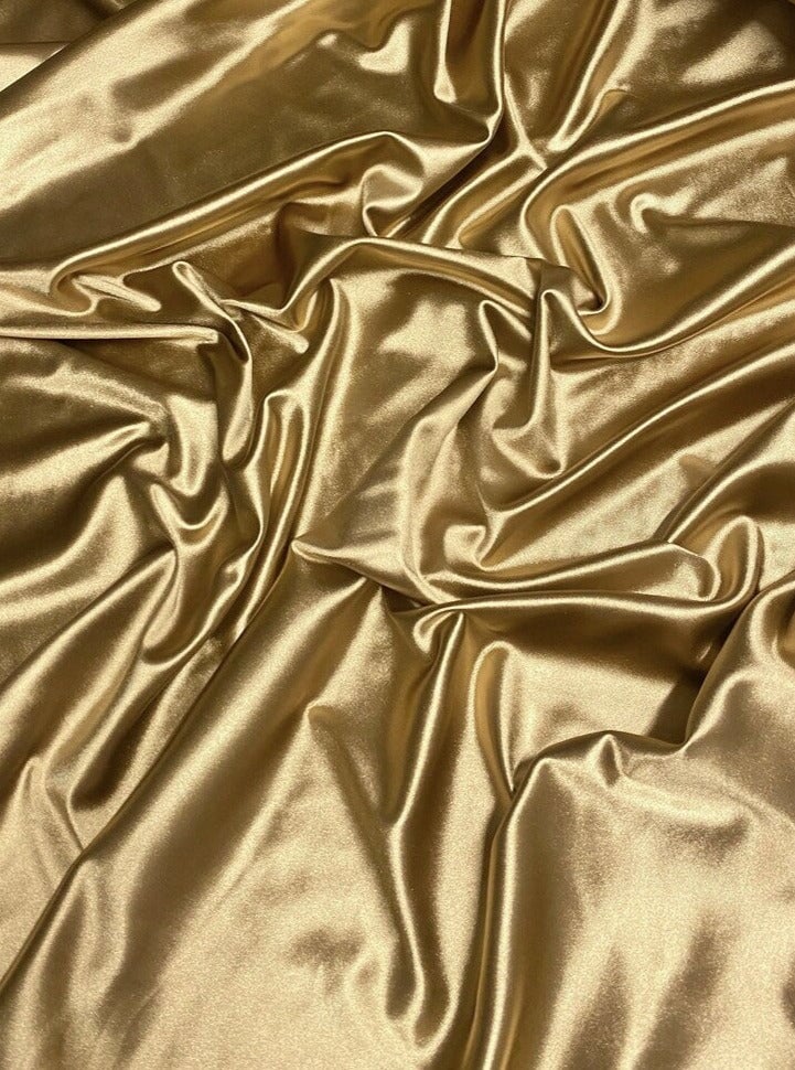 gold spandex, gold foiled spandex, gold milliskin spandex, gold nylon spandex fabric, gold swimwear fabric, gold spandex fabric for leggings, gold metallic spandex, gold spandex for woman, gold spandex for bride, gold spandex in low price, spandex on sale, discounted spandex, premium spandex, buy spandex online