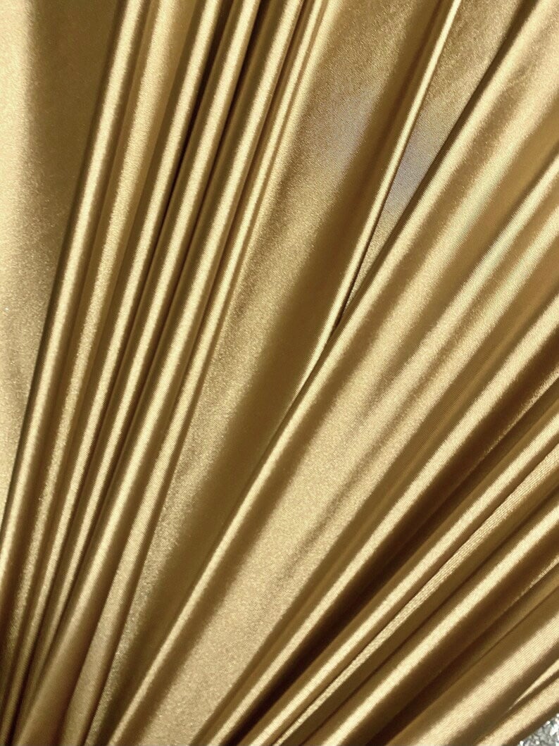 gold spandex, gold foiled spandex, gold milliskin spandex, gold nylon spandex fabric, gold swimwear fabric, gold spandex fabric for leggings, gold metallic spandex, gold spandex for woman, gold spandex for bride, gold spandex in low price, spandex on sale, discounted spandex, premium spandex, buy spandex online