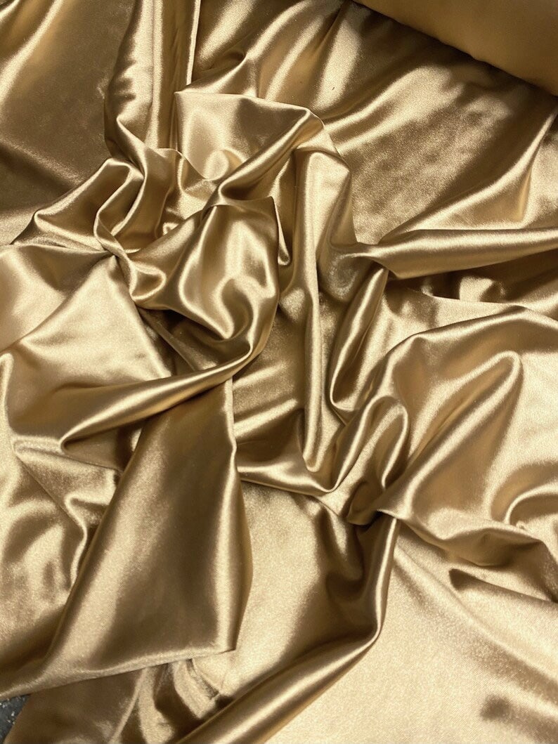 gold spandex, gold foiled spandex, gold milliskin spandex, gold nylon spandex fabric, gold swimwear fabric, gold spandex fabric for leggings, gold metallic spandex, gold spandex for woman, gold spandex for bride, gold spandex in low price, spandex on sale, discounted spandex, premium spandex, buy spandex online