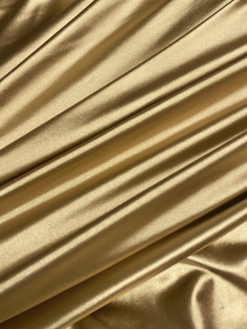 gold spandex, gold foiled spandex, gold milliskin spandex, gold nylon spandex fabric, gold swimwear fabric, gold spandex fabric for leggings, gold metallic spandex, gold spandex for woman, gold spandex for bride, gold spandex in low price, spandex on sale, discounted spandex, premium spandex, buy spandex online