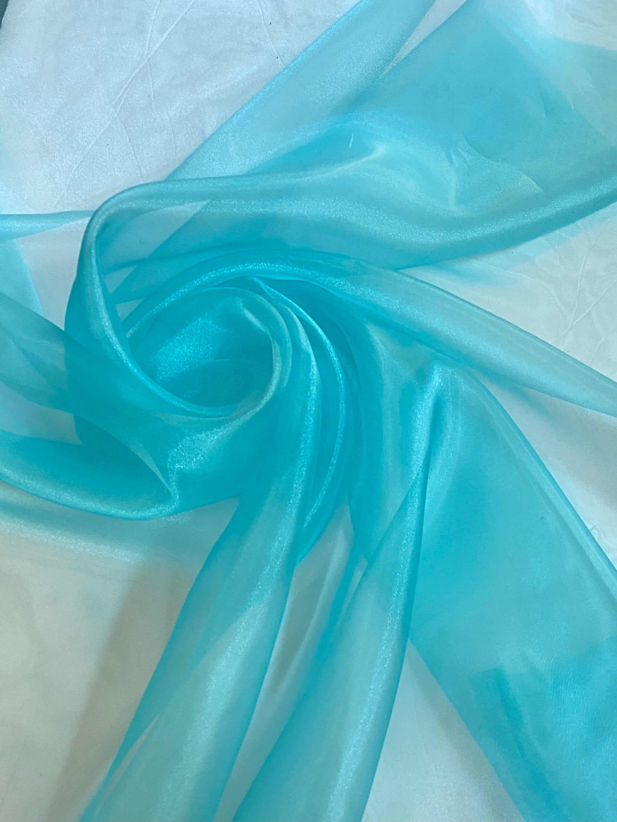 Turquoise Crystal Organza, light blue Crystal Organza for woman, sky blue Crystal Organza, blue Crystal Organza, Crystal Organza in low price, Crystal Organza for bride, Crystal Organza for party wear, premium Crystal Organza, Crystal Organza in low price