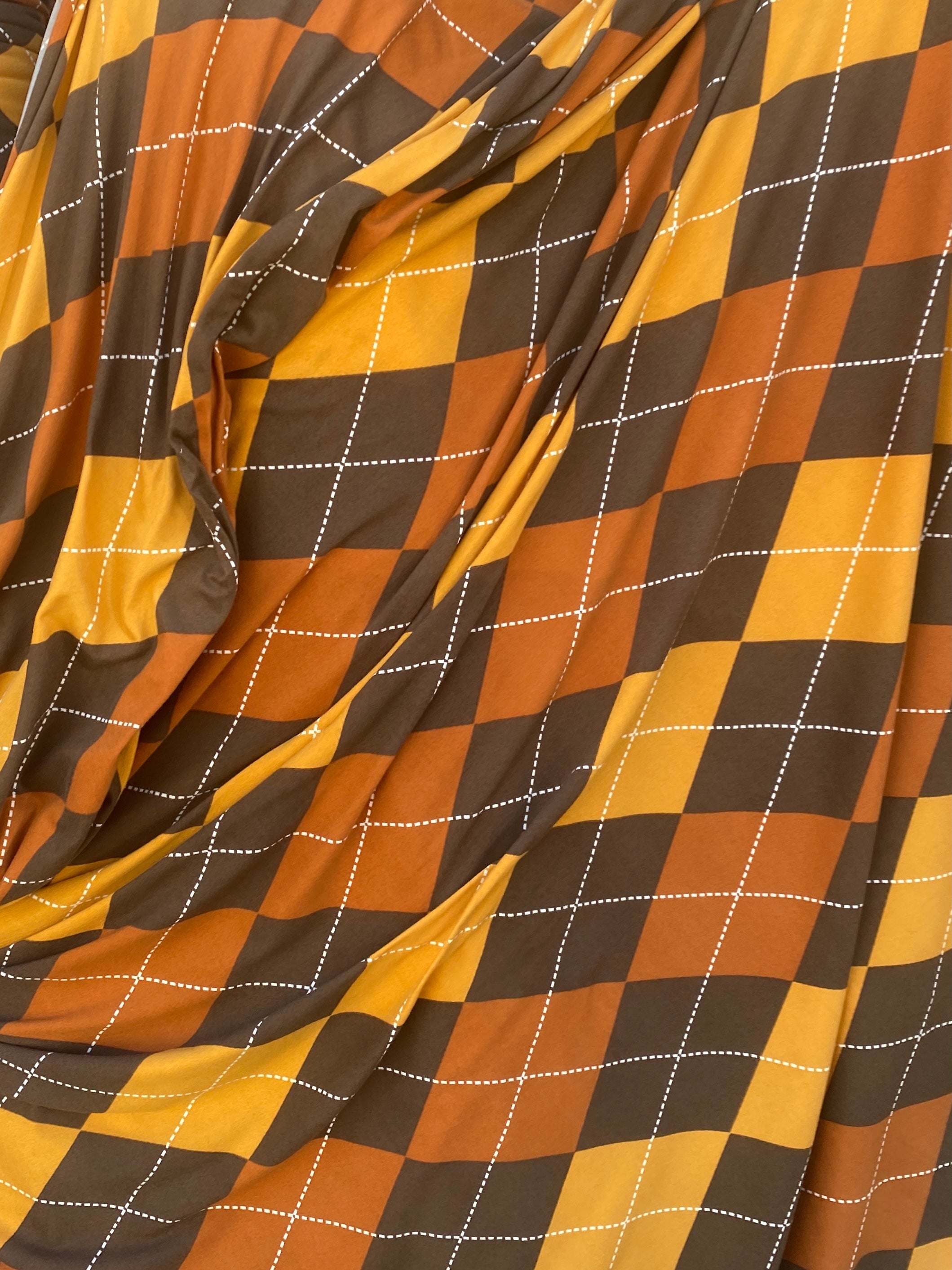 orange plaid brush jersery knit, burnt orange plaid brush jersey knit, pastel orange plaid brush jersey knit, fire orange plaid brush jersey knit, plaid brush jersey knit for scarf, plaid brush jersey knit for dresses, plaid brush jersey knit on discount, plaid brush jersey knit on sale, plaid brush jersey knit in low price, plaid brush jersey knit for woman