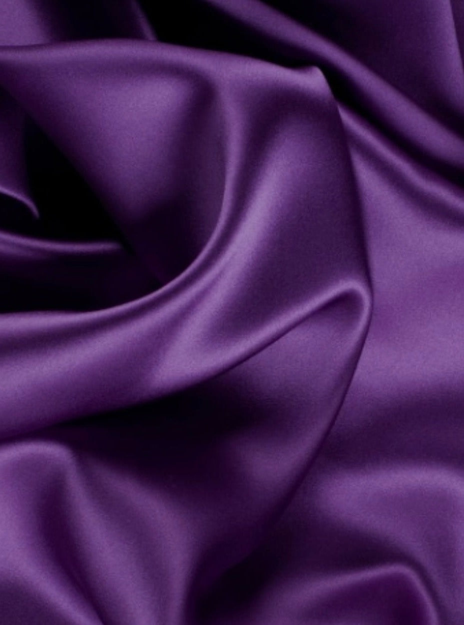 close up look of purple satin fabric 