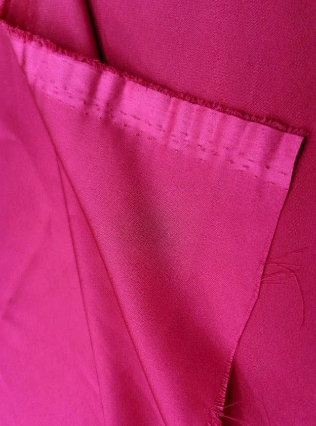 hot pink silky stretch satin swatch with patterns 