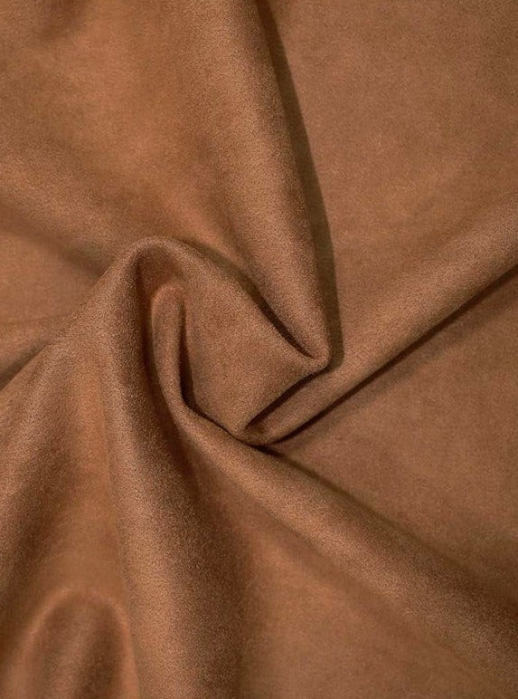 Close-up of brown fabric with folds