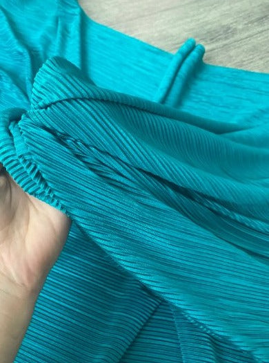 Teal Pleated Stretch Knit, blue Pleated Stretch Knit, light blue Pleated Stretch Knit, party wear Pleated Stretch Knit, shiny Pleated Stretch Knit for woman, Pleated Stretch Knit for bride, Pleated Stretch Knit on discount, Pleated Stretch Knit on sale, buy Pleated Stretch Knit online, Pleated Stretch Knit for gown