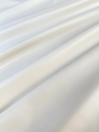 white stretch vinyl, white stretch faux leather, white stretch vinyl, white stretch faux leather, white stretch pvc leather, white stretch pu leather, white stretch matte pleather, white stretch pleather, white stretch leggings fabrics