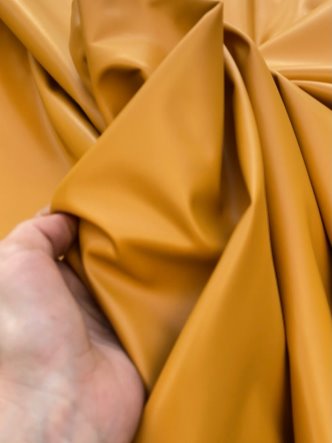 mustard stretch Faux Leather, dark orange leather, shiny faux leather, orange faux leather for woman, faux leather for costumes, faux leather for home decor, 2 way stretch faux leather, leather for blazers, cheap leather, discounted leather, leather on sale