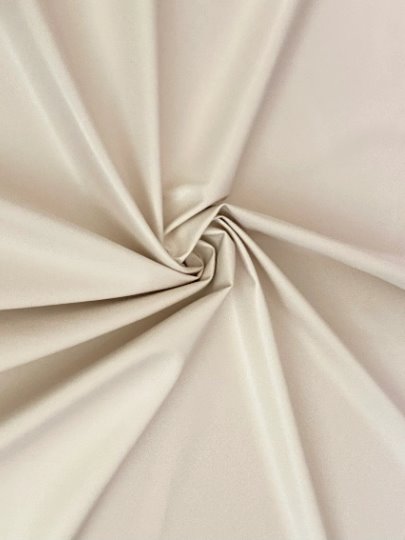 beige stretch faux leather, beige stretch pleather, beige stretch soft vinyl, beige stretch vinyl, faux leather stretch for clothing, Faux Leather for jackets, Faux Leather for bags, Faux Leather on discount, Faux Leather on sale, premium Faux Leather, light color Faux Leather, Faux Leather for tops, Faux Leather for leggings