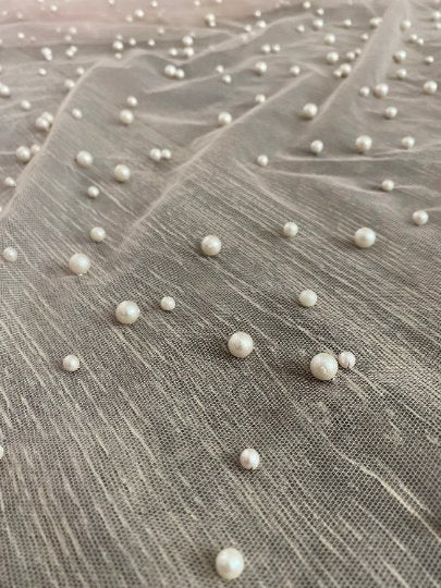 nude Pearl Tulle, white pearl Tulle, bright white pearl Tulle, off white Pearl Tulle, shinny Pearl Tulle, Pearl Tulle for woman, Pearl Tulle for bride, Pearl Tulle on discount, Pearl Tulle on sale, premium Pearl Tulle, buy Pearl Tulle online