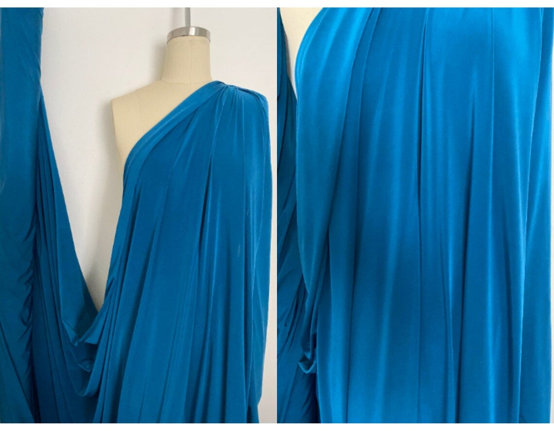 Teal Jersey ITY Spandex, blue ity knit, dark blue ity knit, shiny blue ity knit, ity knit for woman in teal blue, knit for costume, knit for sweatpants, knit for gown, knit on discount, knit in low price, ity fabric on sale