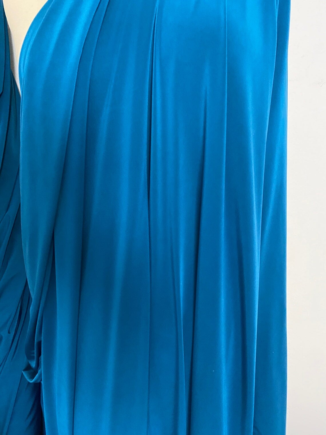 Teal Jersey ITY Spandex, blue ity knit, dark blue ity knit, shiny blue ity knit, ity knit for woman in teal blue, knit for costume, knit for sweatpants, knit for gown, knit on discount, knit in low price, ity fabric on sale