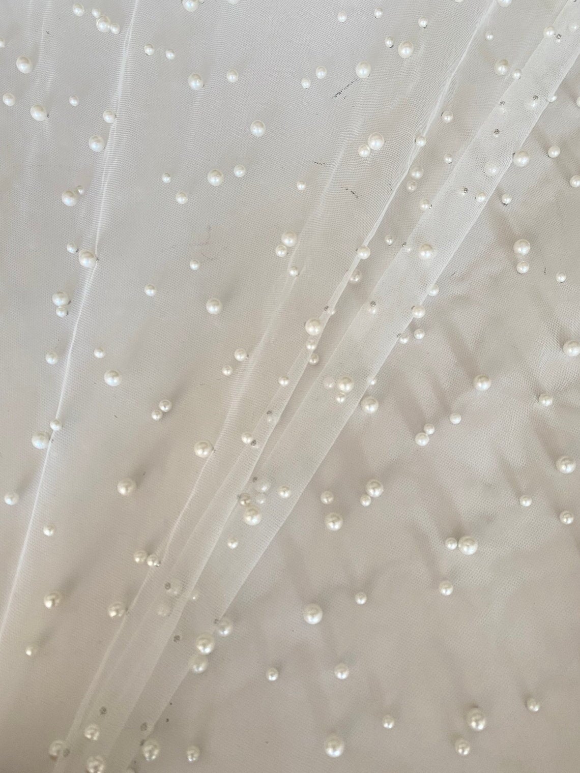 off white Pearl Tulle, white pearl Tulle, bright white pearl tulle, milky white Pearl Tulle, shinny Pearl Tulle, Pearl Tulle for woman, Pearl Tulle for bride, Pearl Tulle on discount, Pearl Tulle on sale, premium Pearl Tulle, buy Pearl Tulle online