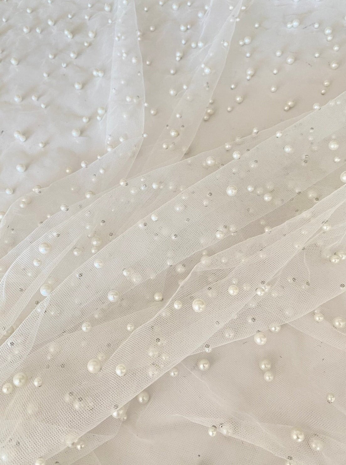 off white Pearl Tulle, white pearl Tulle, bright white pearl tulle, milky white Pearl Tulle, shinny Pearl Tulle, Pearl Tulle for woman, Pearl Tulle for bride, Pearl Tulle on discount, Pearl Tulle on sale, premium Pearl Tulle, buy Pearl Tulle online