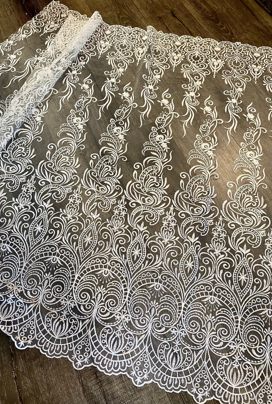 White Embroidered Lace, off white Embroidered Lace for gown, Bridal Lace Fabric, Scalloped lace, Floral Lace double edged, lace fabric on discount, lace fabric on sale, premium lace fabric, buy lace fabric online, glitter lace fabric