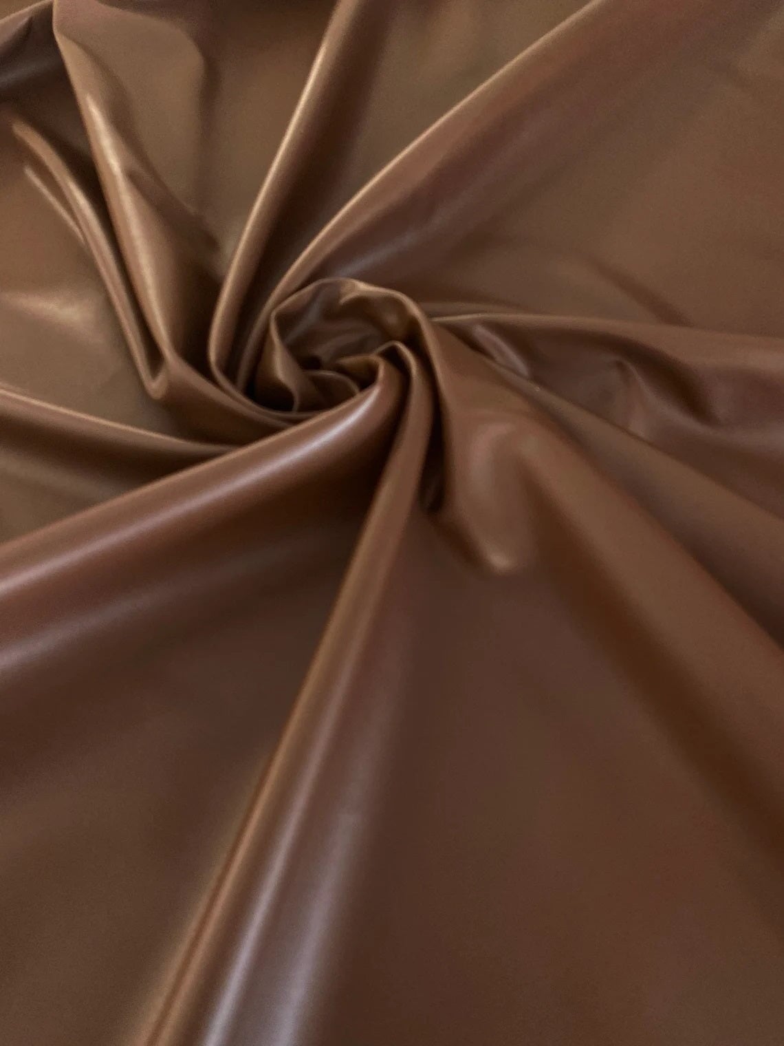 Chocolate stretch faux leather, Chocolate stretch pleather, Chocolate stretch soft vinyl, Chocolate stretch vinyl, faux leather stretch for clothing, Faux Leather for jackets, Faux Leather for bags, Faux Leather on discount, Faux Leather on sale, premium Faux Leather, dark brown Faux Leather, brown Faux Leather, Faux Leather for tops, Faux Leather for leggings