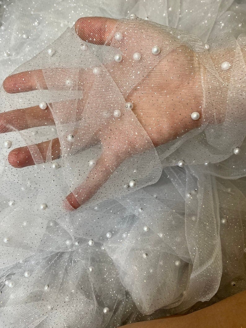 white Tulle Bead Pearl Lace Fabric, off white Pearl Beaded Tulle for Veil, bright white Beaded Pearl Tulle Lace Fabric by the yard, milky white pearl scattered tulle, Pearl Tulle Fabric for woman, Pearl Tulle Fabric for party wear, Pearl Tulle Fabric on discount,Pearl Tulle Fabric on sale