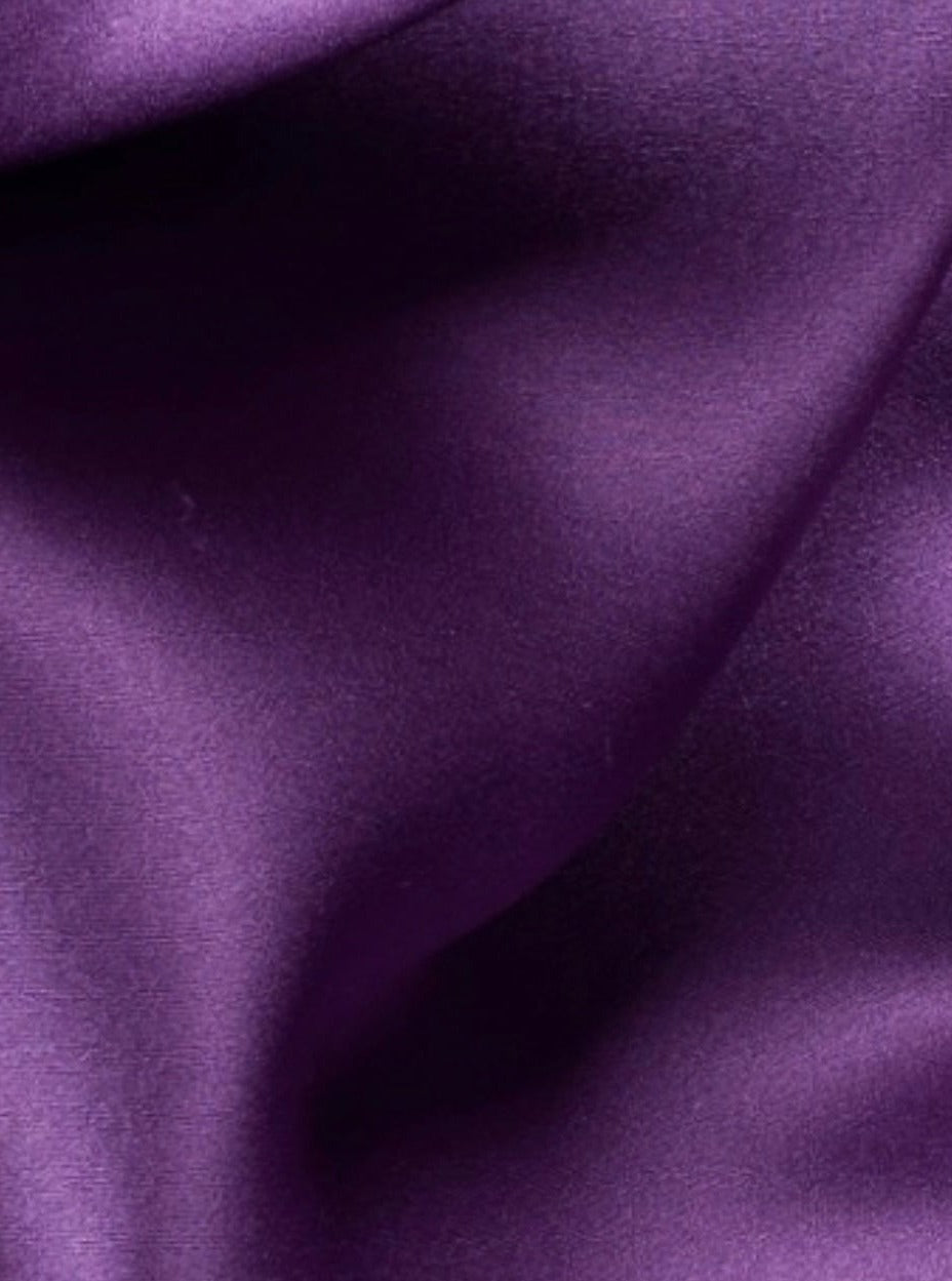 image of shiny purple fabric with texture 